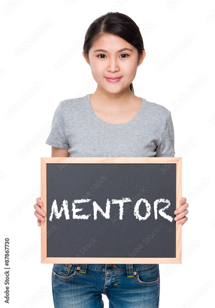 Woman hold with chalkboard and showing a word mentor Woman hold with chalkboard and showing a word mentor
