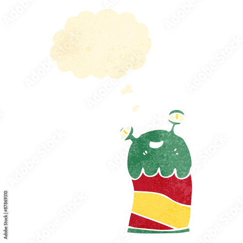cartoon little alien with thought bubble