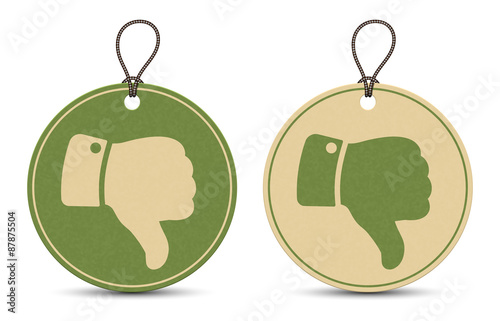 Two paper thumb down tags isolated on white background