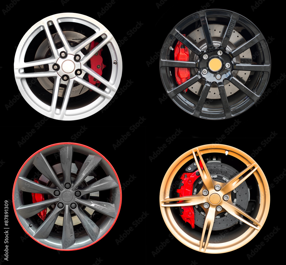 Collage of Four car rims isolated on black background.