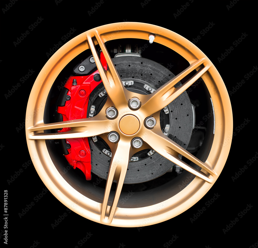 Obraz premium Sports car rim isolated on black background.