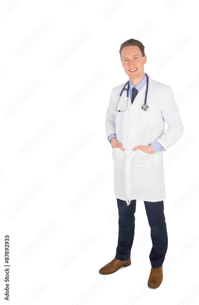 Smiling doctor with hands in pocket Smiling doctor with hands in pocket