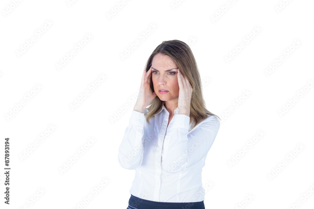 Stressed businesswoman with hands on her head Stressed businesswoman with hands on her head