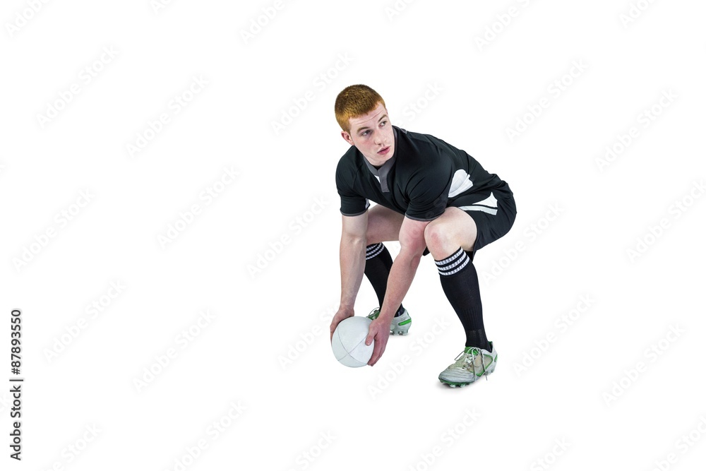 Rugby player about to throw a rugby ball