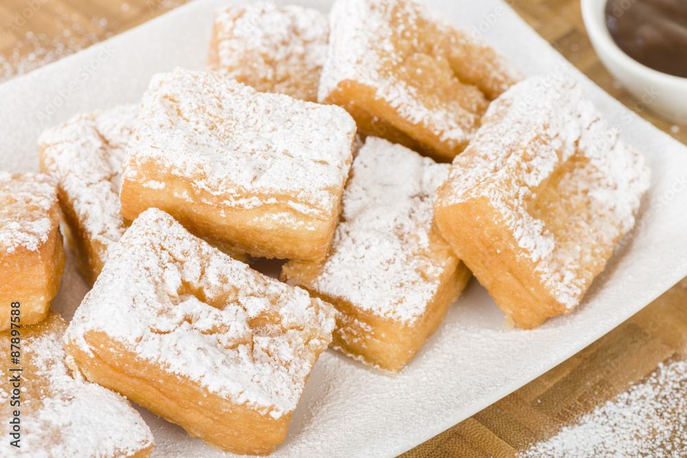 Yum Yum - Sweet toffee flavoured fried pastry dusted with icing sugar.
