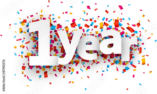 One year paper confetti sign.