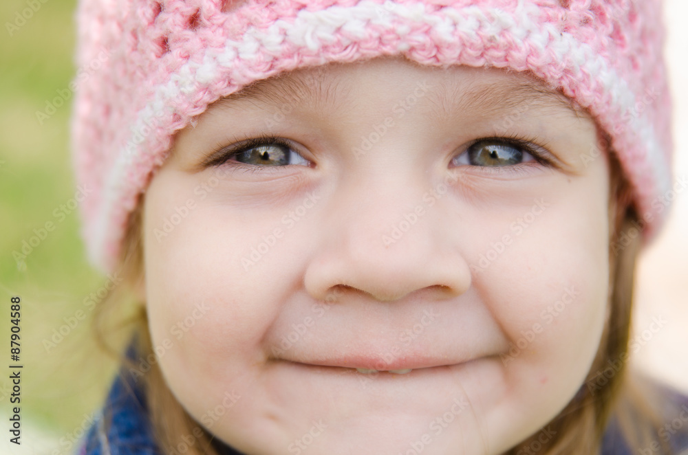Close-up portrait of a smiling three-year girl Close-up portrait of a smiling three-year girl