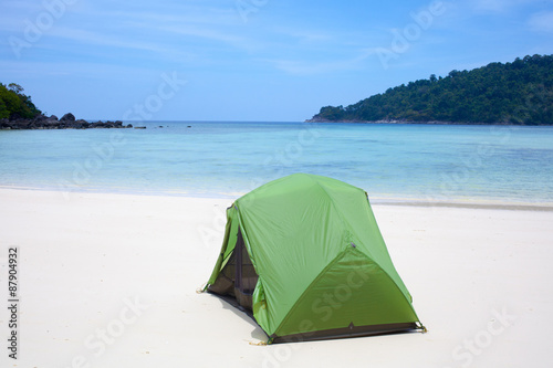 beach tent, a green tent setup on the Andaman ocean white sand beach, Thailand © akeeris