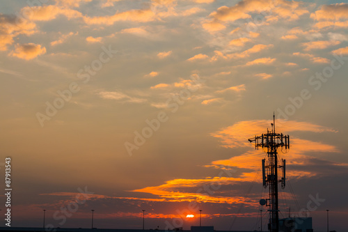 Silhouette Telecommunication tower on sunset