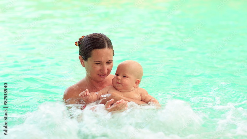 Mother and baby in the pool Mother and baby in the pool