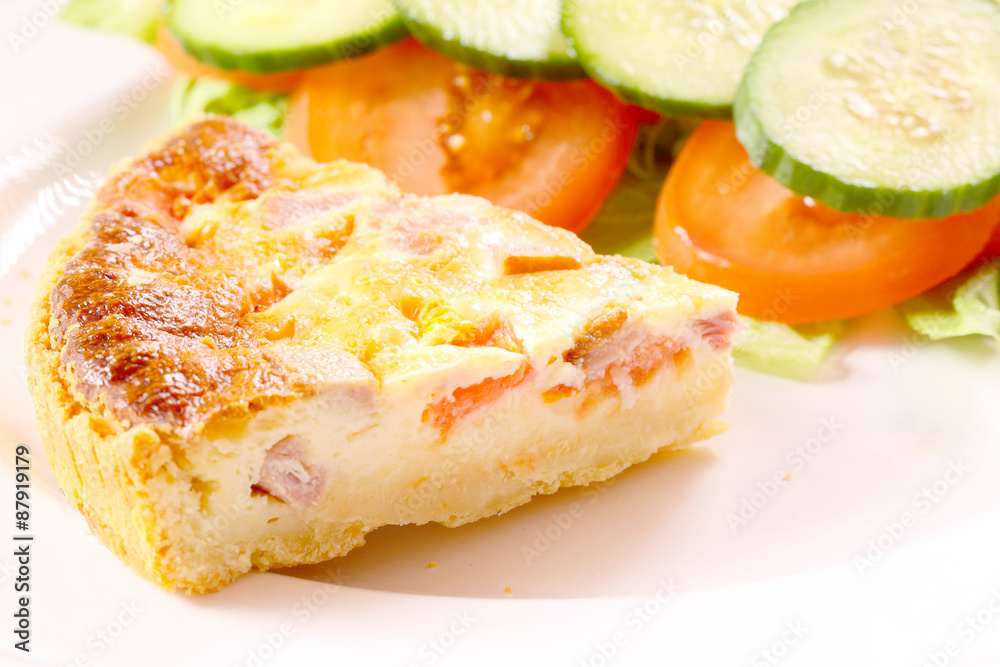 Quiche salad.
A piece of Quiche Lorraine with salad. Quiche salad.
A piece of Quiche Lorraine with salad.