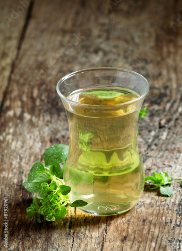 Herbal tea with oregano, selective focus