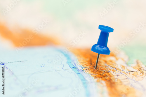 Travel destination, blue pin on the map