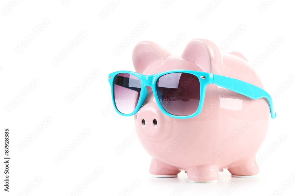 Pink piggy bank with glasses isolated on a white Pink piggy bank with glasses isolated on a white