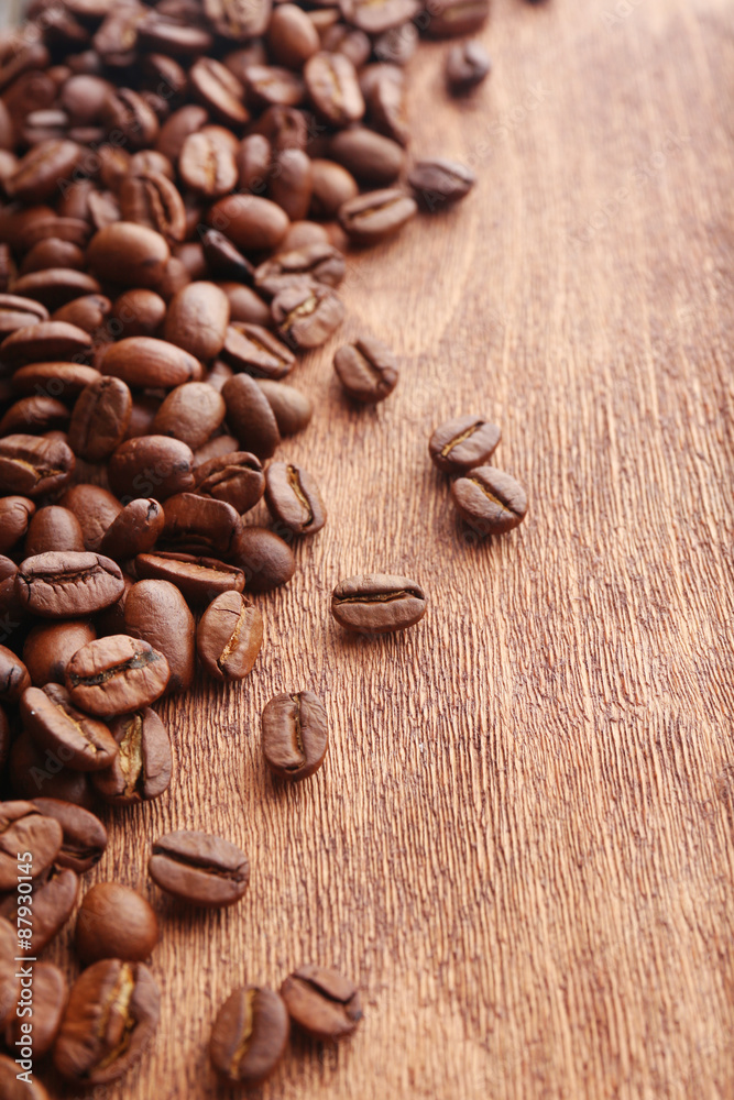 Coffee beans on wooden background Coffee beans on wooden background