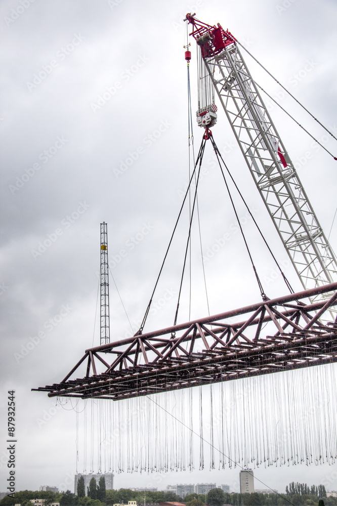 Crane at the docks of the Schelde river in the city of Antwerp in Belgium
Crane at the docks of the Schelde river in the city of Antwerp in Belgium