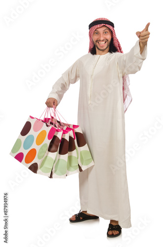 Arab man with shopping bags on white