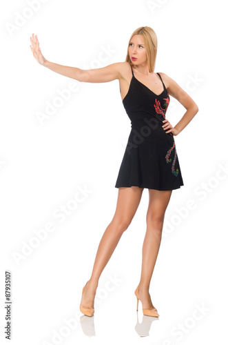 Tall young woman in black dress isolated on white © Elnur