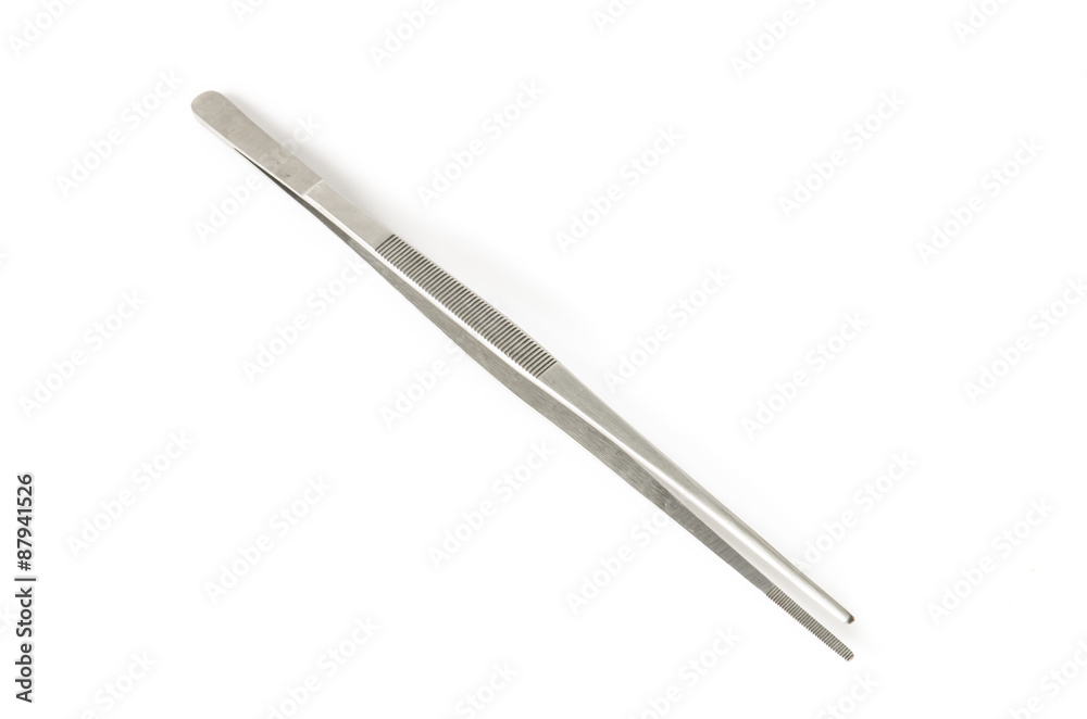 metal tweezers isolated over the white background