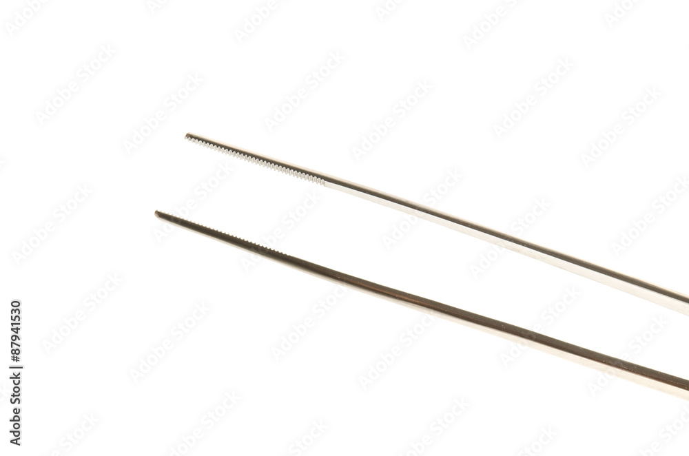 metal tweezers isolated over the white background metal tweezers isolated over the white background