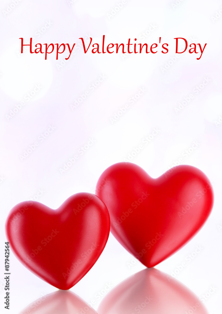 Red hearts on light background Red hearts on light background