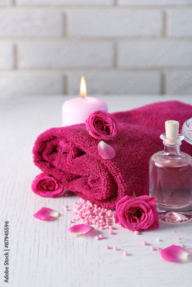 Beautiful composition of spa treatment on white wooden table Beautiful composition of spa treatment on white wooden table