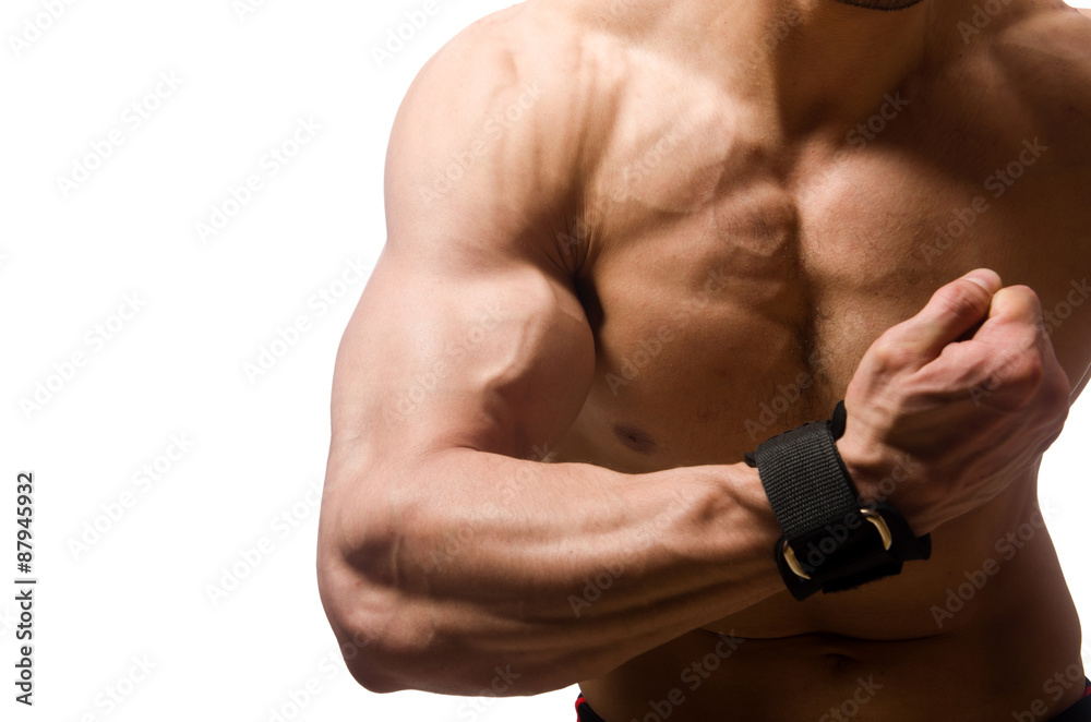 Naklejka premium Muscular man isolated on the white background