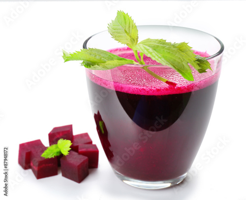 Fresh beet juice isolated on white