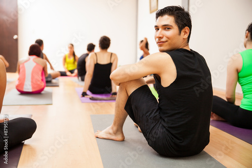 Attractive man in yoga class