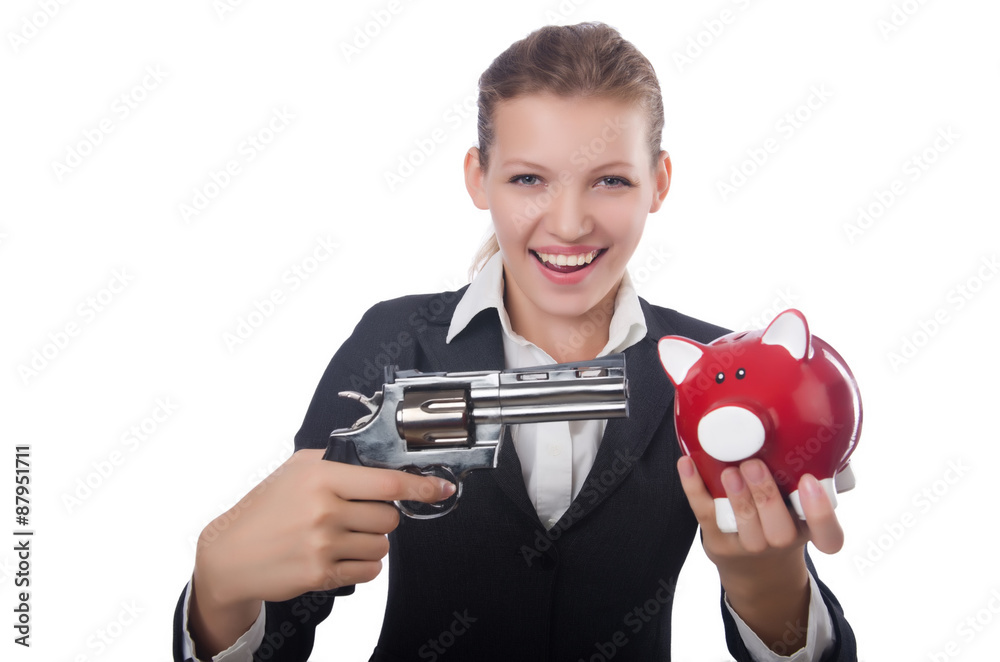 Business lady holding moneybox and gun isolated on white Business lady holding moneybox and gun isolated on white