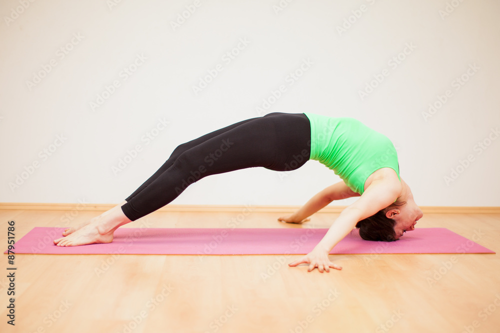 Strong woman doing yoga