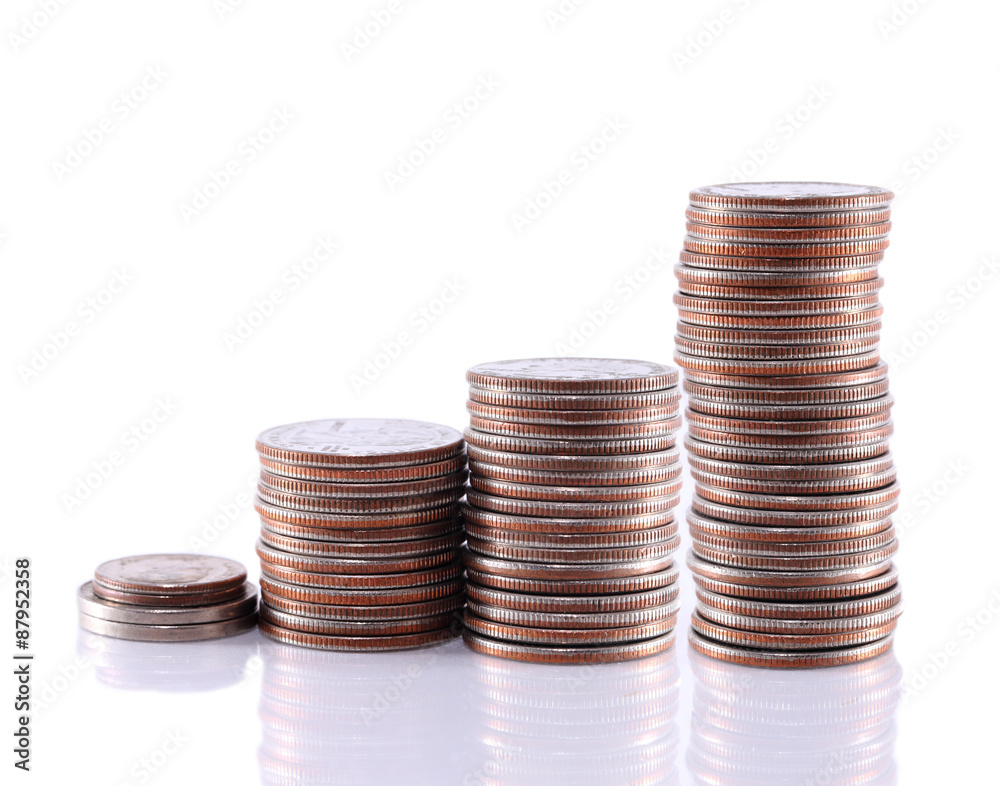 Savings, increasing columns of gold coins isolated on white background Savings, increasing columns of gold coins isolated on white background