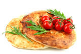 Pita bread and vegetables isolated on white