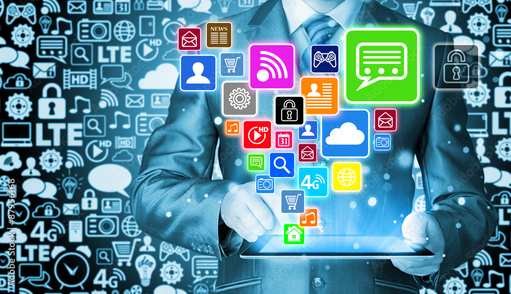 Business man using tablet PC with social media icon set Business man using tablet PC with social media icon set