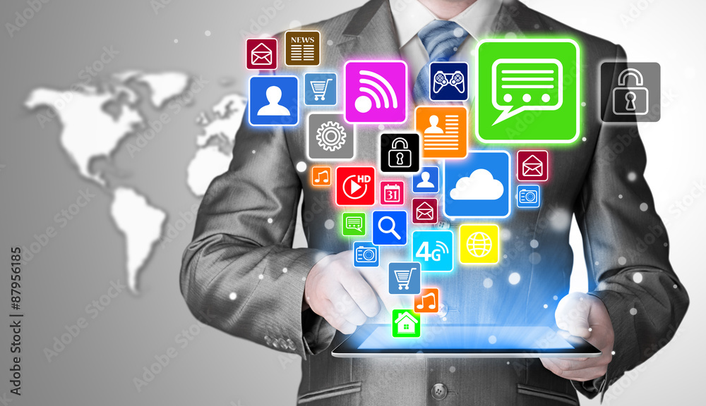 Business man using tablet PC with social media icon set Business man using tablet PC with social media icon set