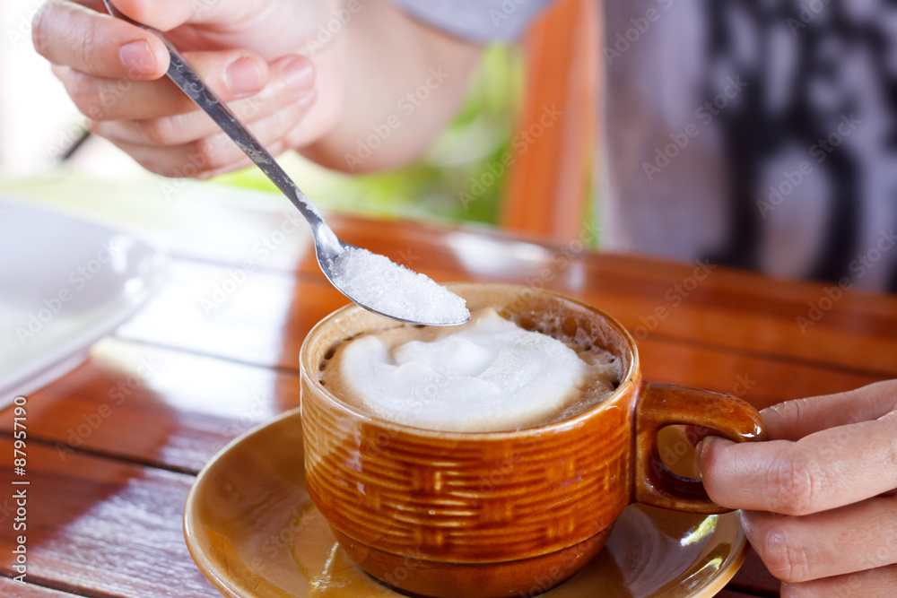 A cup of coffee. A cup of coffee.