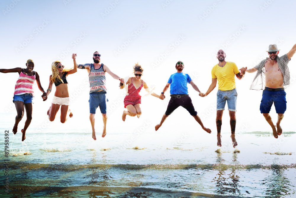 Obraz premium Diverse Beach Summer Friends Fun Jump Shot Concept