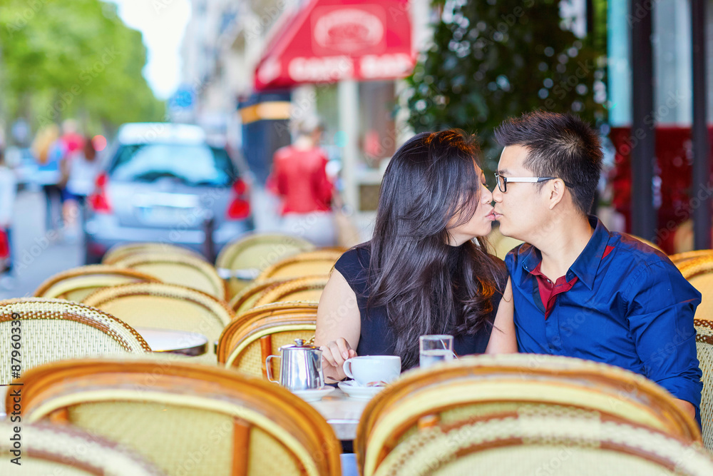 Fototapeta premium Young romantic Asian couple in Paris