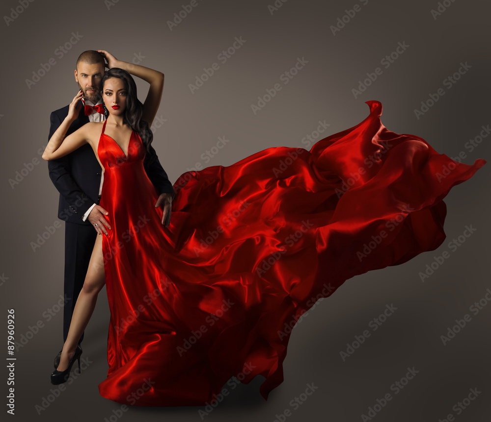 Fototapeta Fashion Couple Portrait, Woman Red Dress, Man in Suit, Long Cloth