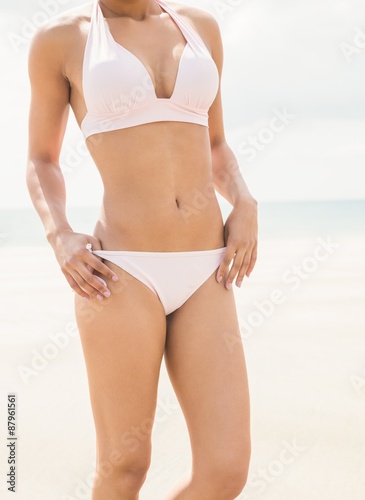 Fit woman in white bikini
