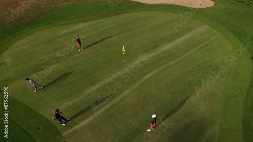 Aerial perspective of four player at the golf course in Bad Homburg filmed by a drone.