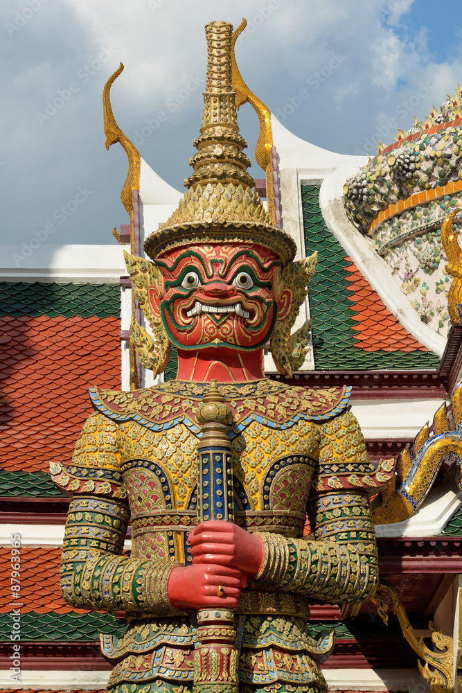 The Golden Pagoda and Yak statue at the phra kaew, bangkok,Thailand