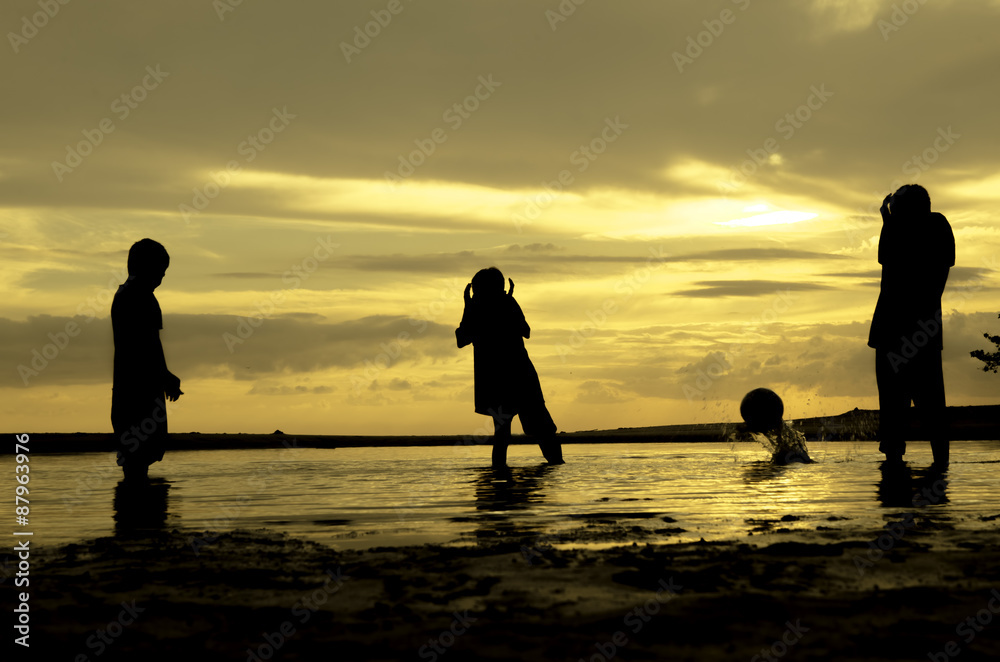 image silhouette three boys plays beach ball and moment the ball falling during sunset sunrise