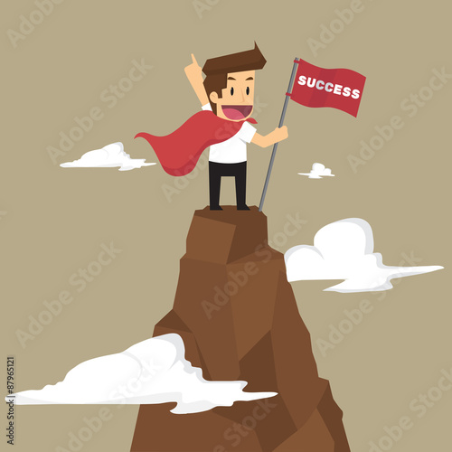 businessman holding a flag that succeed in mountain