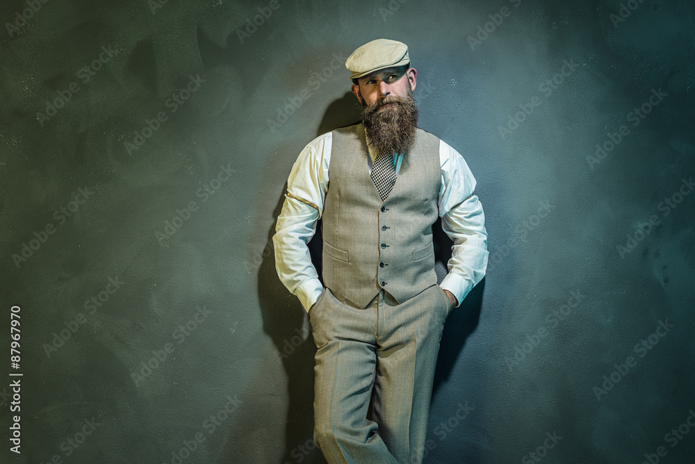 Elegant Middle Aged Man Leaning Against Wall Elegant Middle Aged Man Leaning Against Wall
