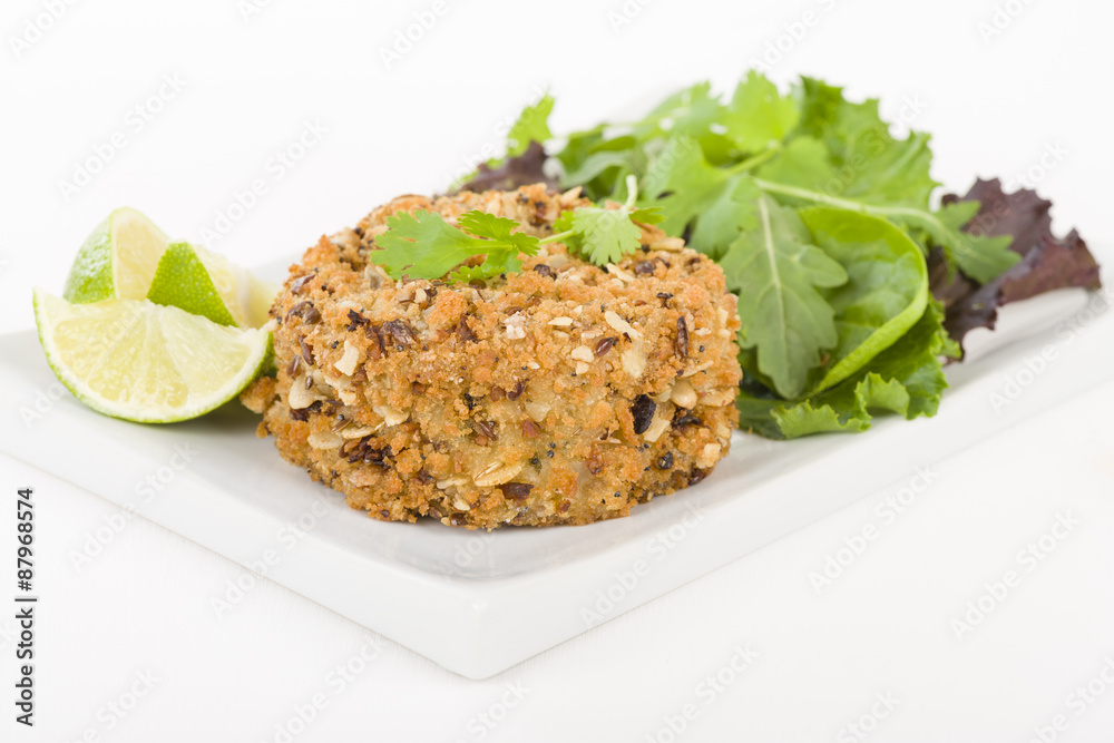 Fishcake - Deep-fried tuna, lime and coriander fishcake served with salad.
Fishcake - Deep-fried tuna, lime and coriander fishcake served with salad.