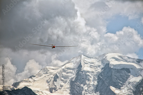 glider over swiss alps glacier view in Engadina