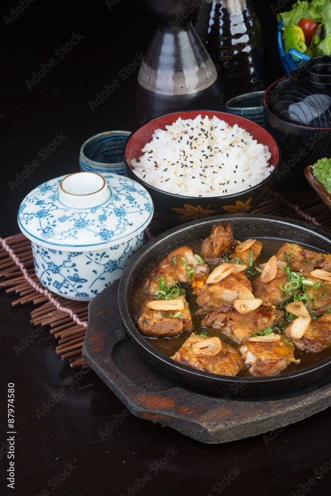 japanese cuisine. hot plate chicken on the background japanese cuisine. hot plate chicken on the background