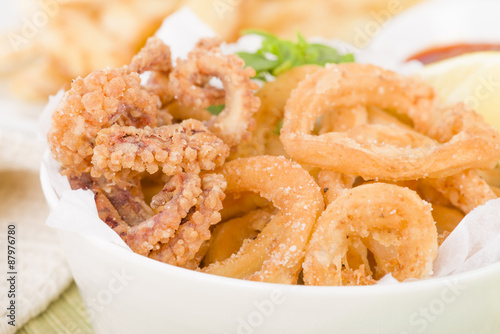 Calamari - Deep-fried squid rings served with garlic mayo and chili sauce.
