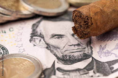 Money five Dollar Bill and Cuban cigar